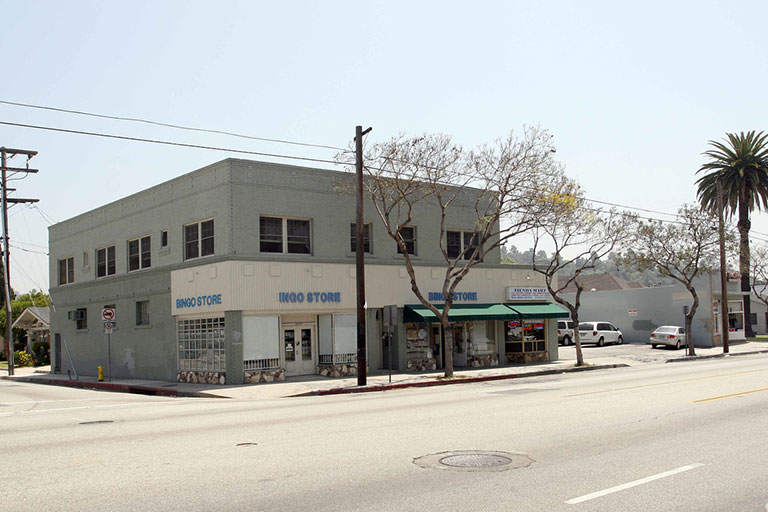 Street view of a corner store building.