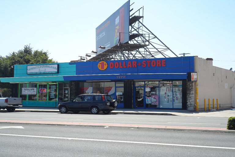 Street view of a dollar store exterior.