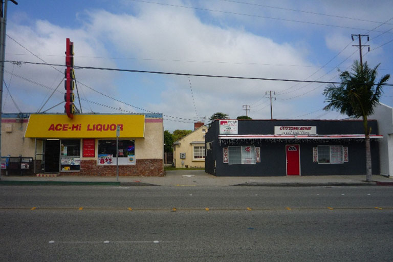 Street view of two small storefronts.