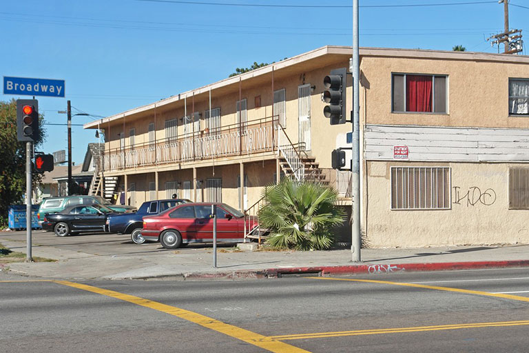 Two-story building at street intersection.