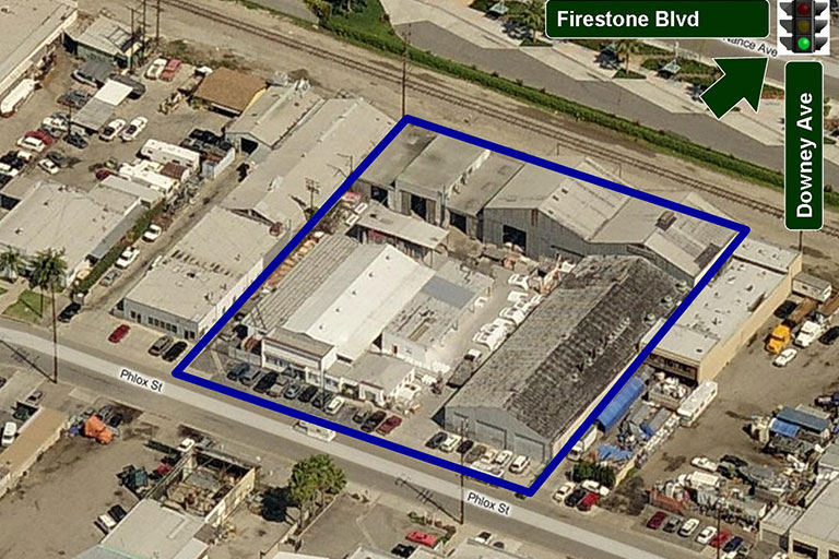 Aerial view of industrial buildings and streets.