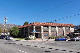 Street view of a two-story building.