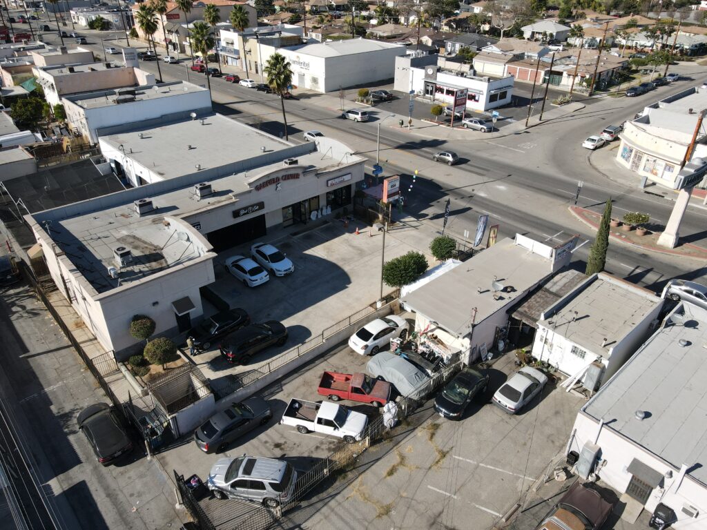Aerial view of a busy urban intersection.